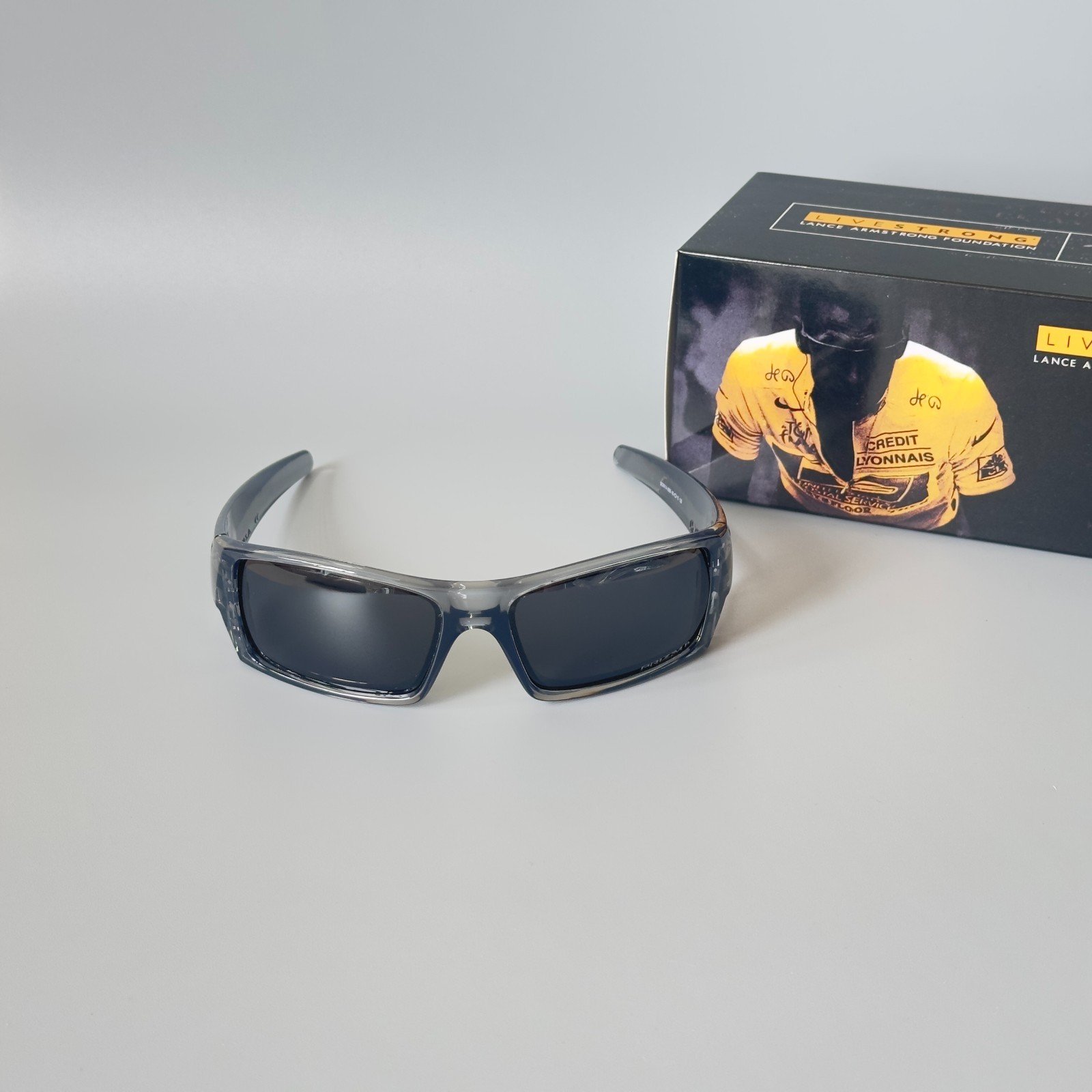 Oakley Gascan OO9014 Polarized Sunglasses Gray transparent Frame Black Lens