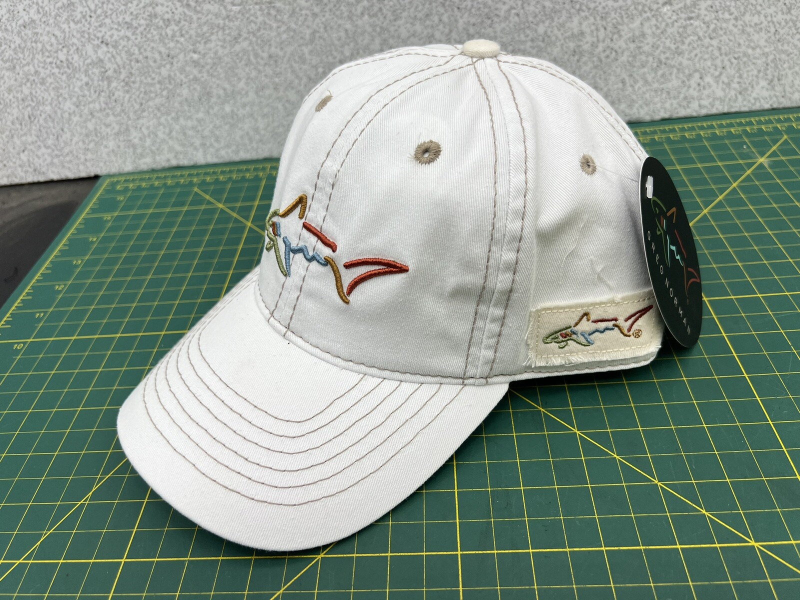 Greg Norman Beige w/ Tan Stitching Embroidered Shark Logo Golf Hat Cap – New!