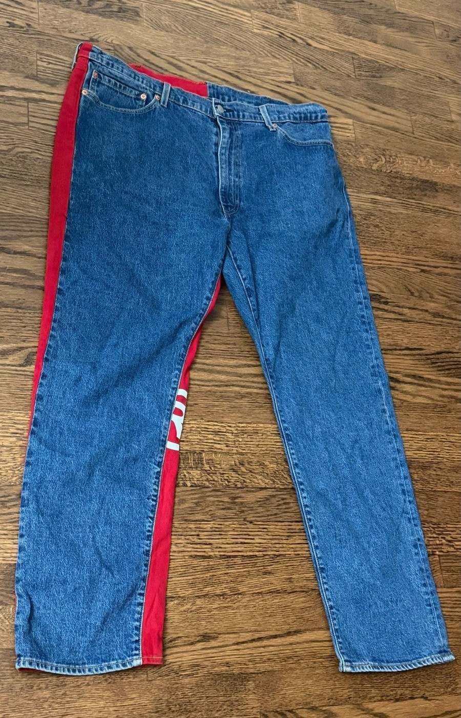 Levi’s Premium Men’s Blue/Red Split Logo Denim Jeans Athletic Taper Stretch