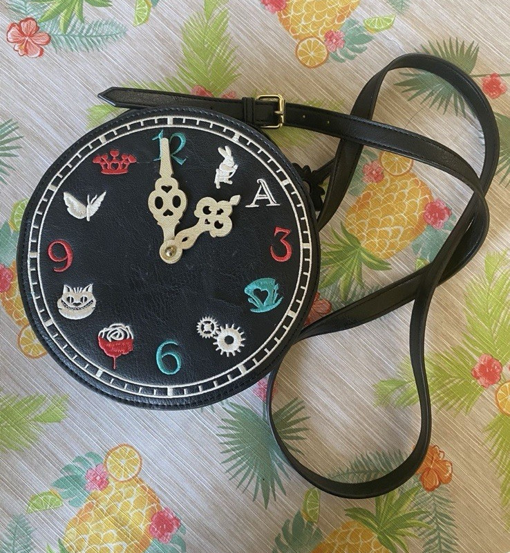 Danielle Nicole Alice in Wonderland Round Small Black Crossbody Zip Bag Clock