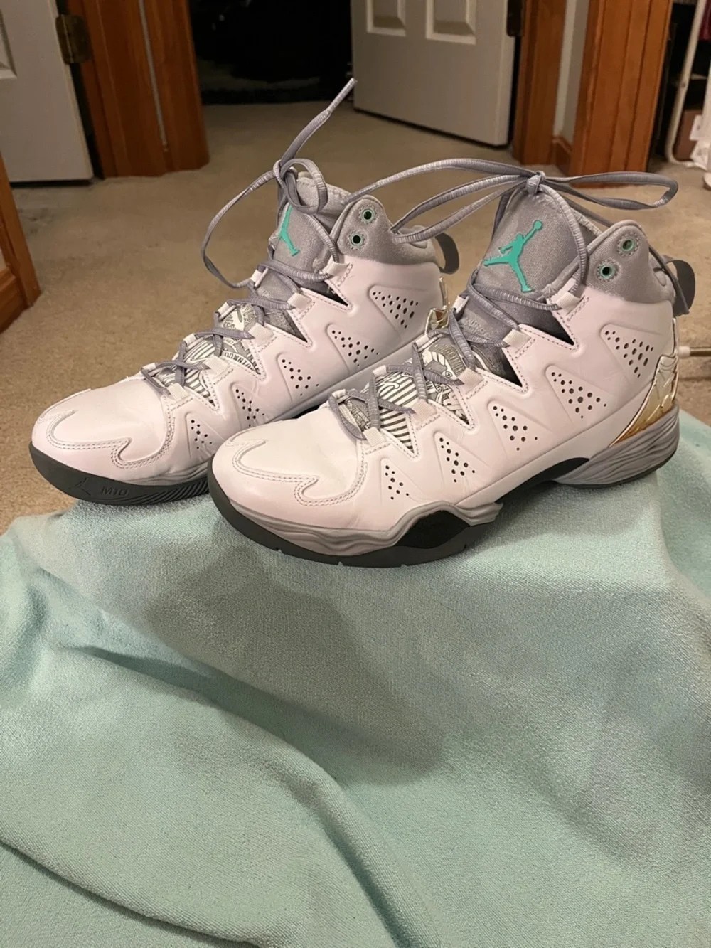 Air Jordan Melo M10 in the Green Glow color way