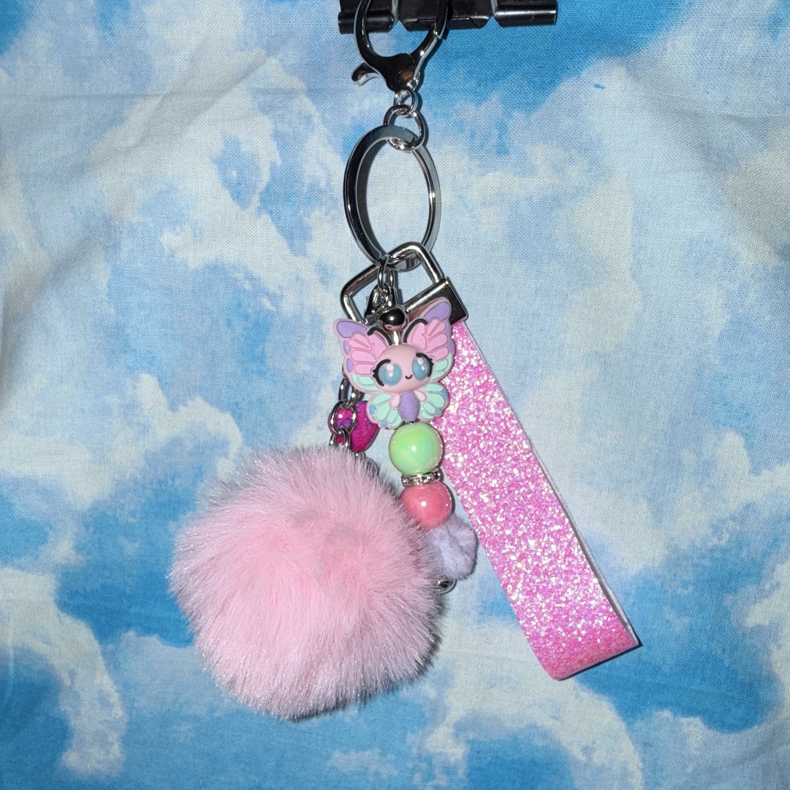 Pink Glitter Wristlet Strap Key Chain/Bag Charm w/Butterfly Beads & Pom Pom