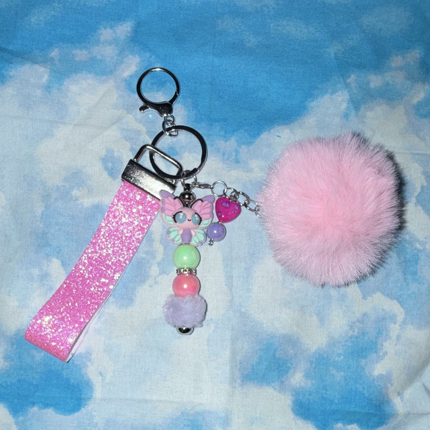 Pink Glitter Wristlet Strap Key Chain/Bag Charm w/Butterfly Beads & Pom Pom