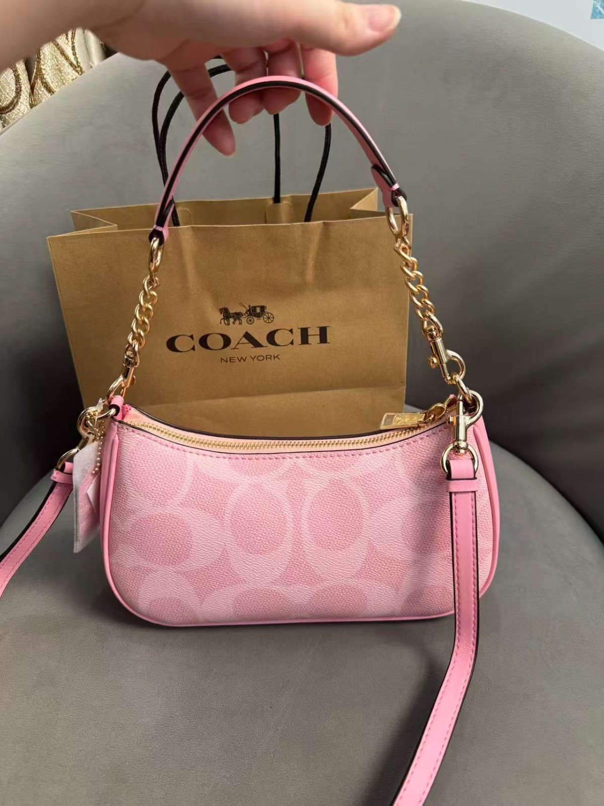Teri Shoulder Bag In signature canvas/Gold/Powder Pink New CAL51