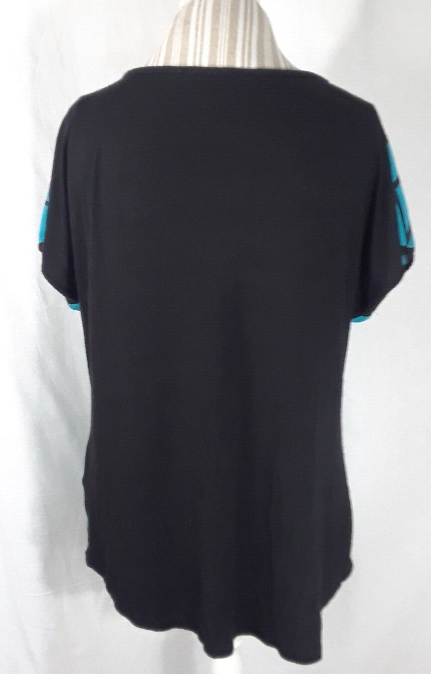 TA1-22 Espresso Women’s XL Blouse in black with blue geometric patterns in front