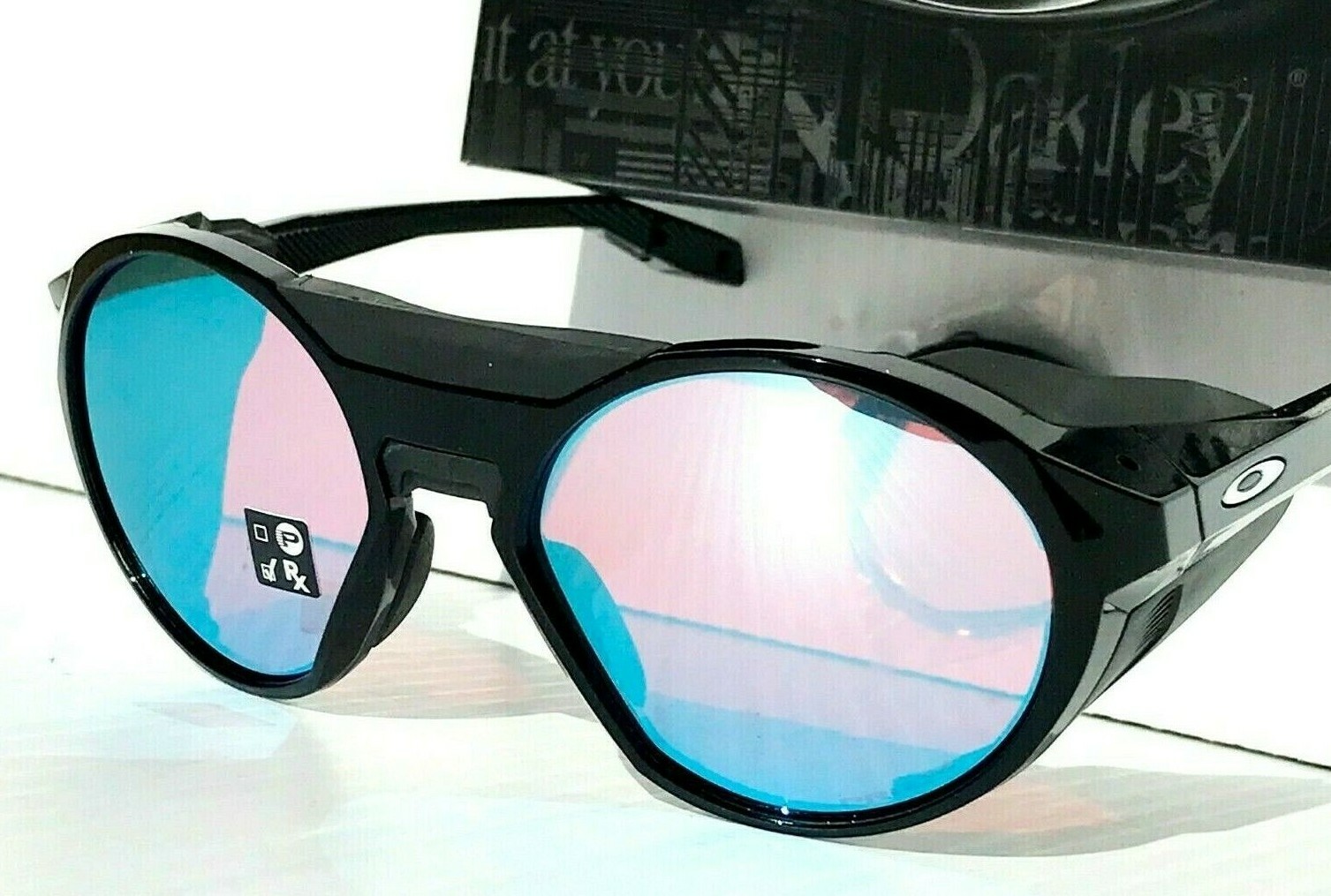 NEW Oakley CLIFDEN Polished Black Round PRIZM Snow Sapphire Sunglass 9440-02