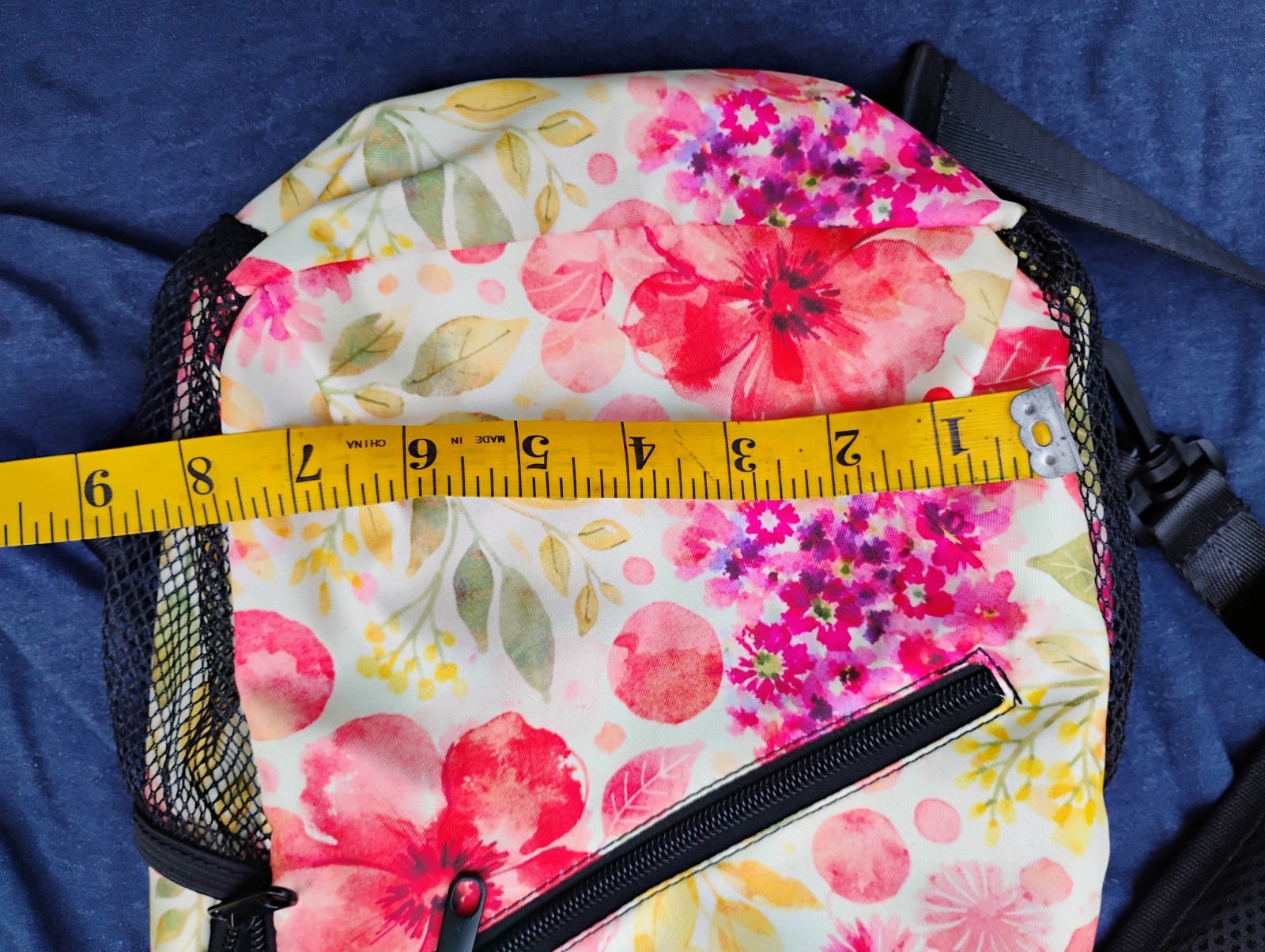 Cross body backpack sling with floral print adjustable strap