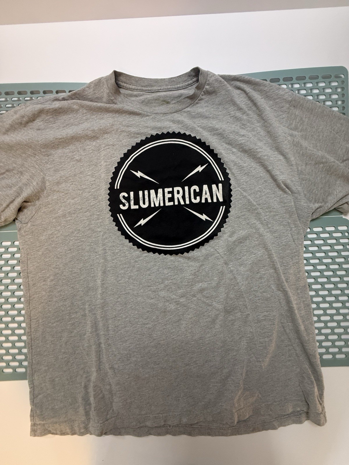 Slumerican Shirt Bundle… 13 Shirts Most Are Large Some Are Xl.