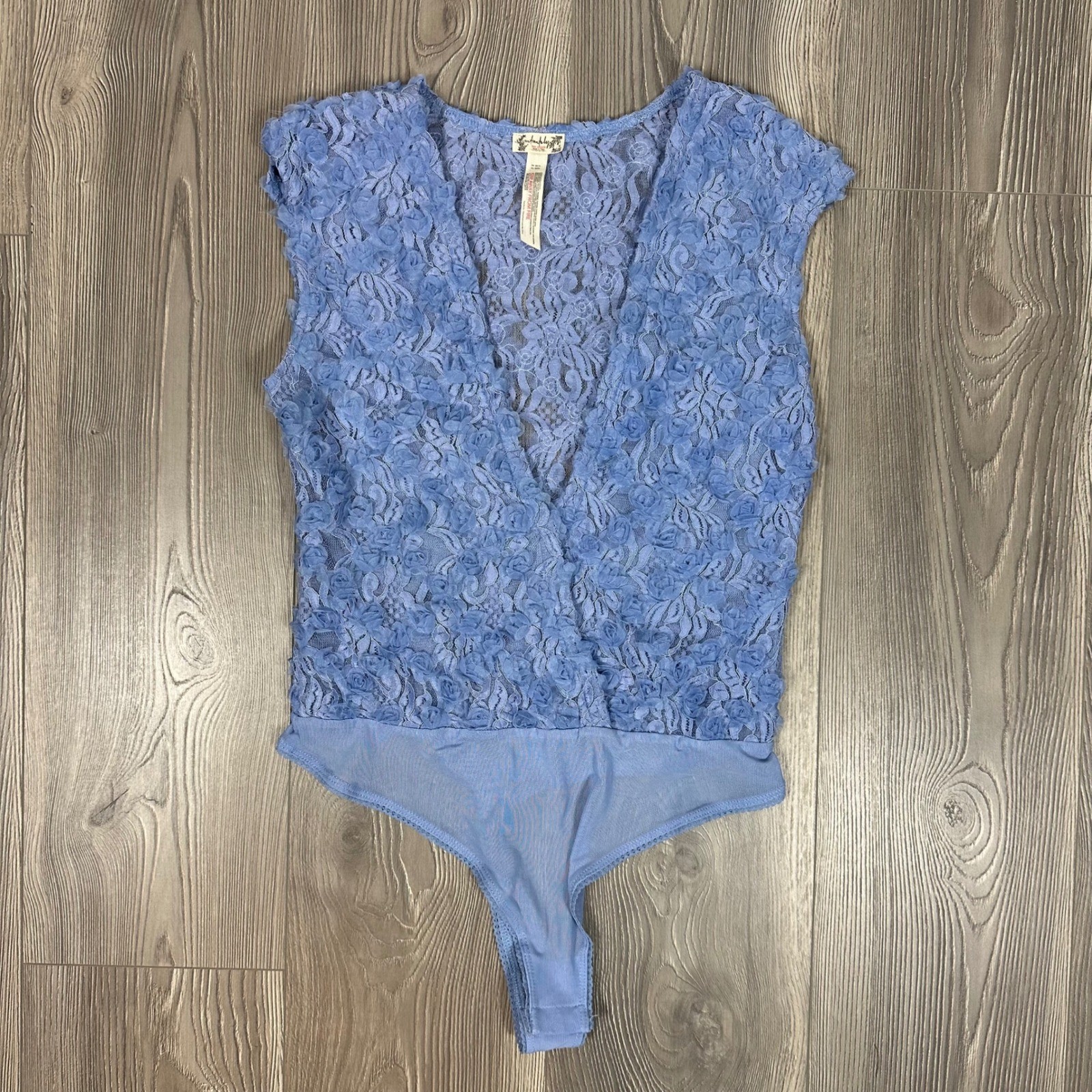 Free People Periwinkle Sheer Low Cut Floral Bodysuit w/ Rosette Details – SIZE M