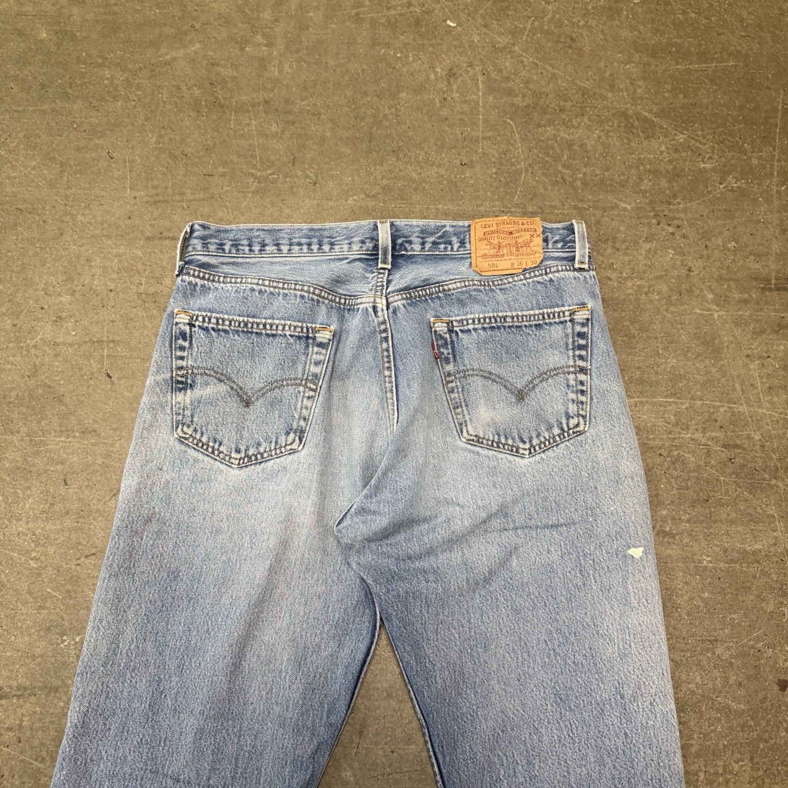 VINTAGE 90s Levi’s 501 Series button fly light wash straight jeans distressed