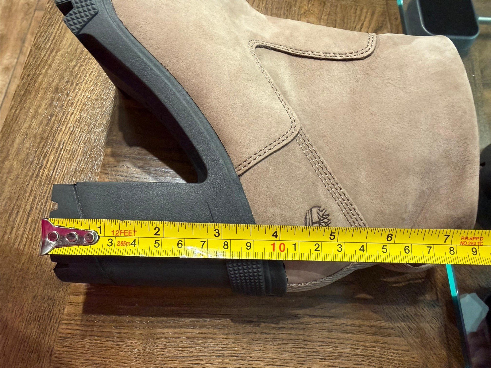Timberland- Women’s mid zip boot with Defender Repellent Systems