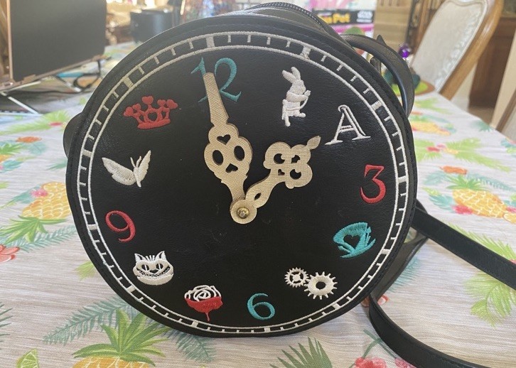 Danielle Nicole Alice in Wonderland Round Small Black Crossbody Zip Bag Clock