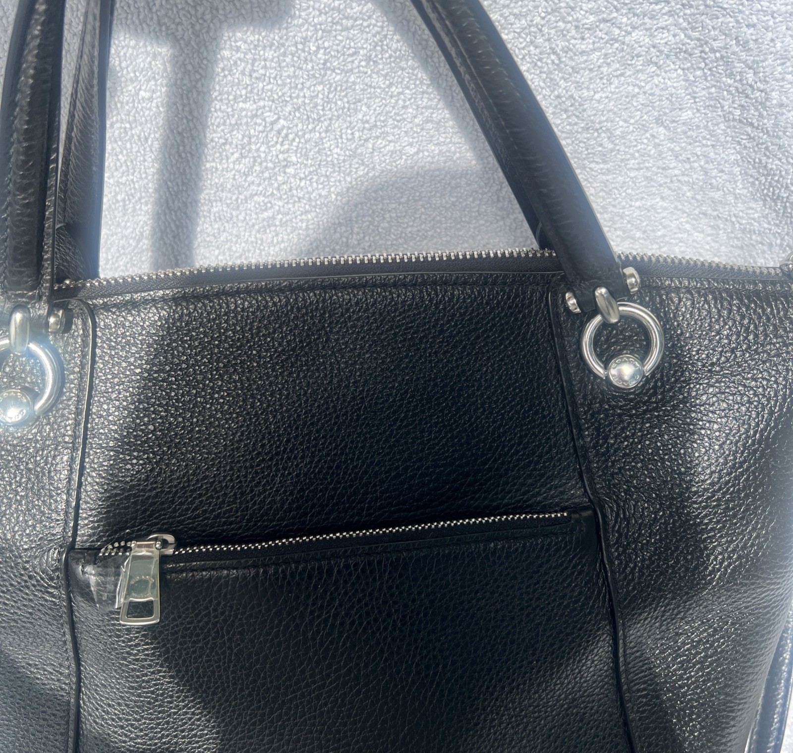 Coach Crossbody Bag Black Pebble Leather black Interior with silver hardware.