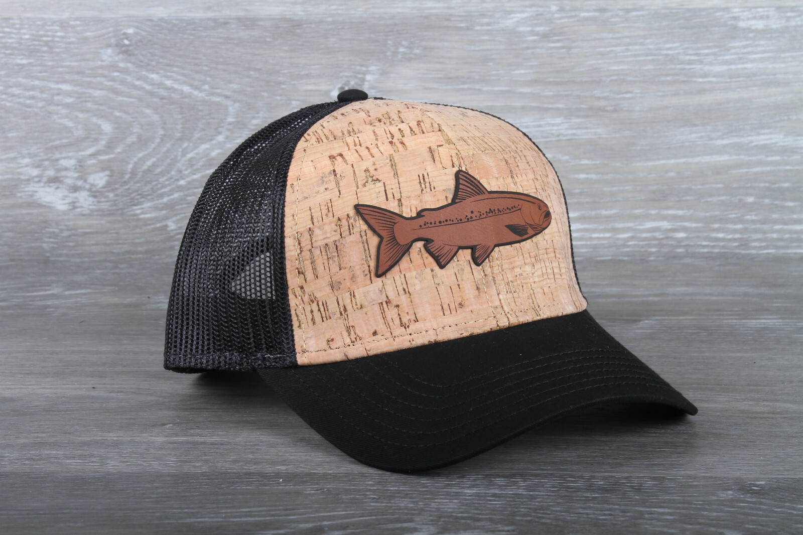 Rainbow trout leather patch on an Otto 6 Panel Cork Mesh Back Hat