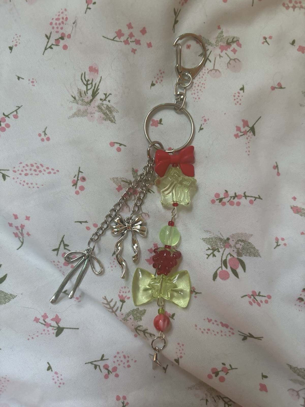 Handmade Raspberry themed acrylic beaded silver bow accented keychain