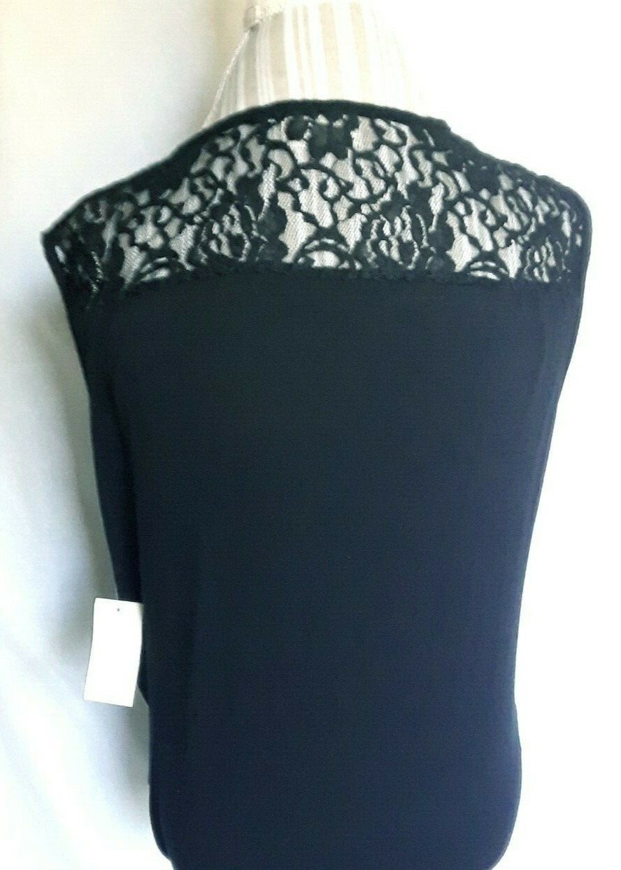 TA1-18 Free Kisses woman’s black sleeveless top size XL, new with tags soft lace
