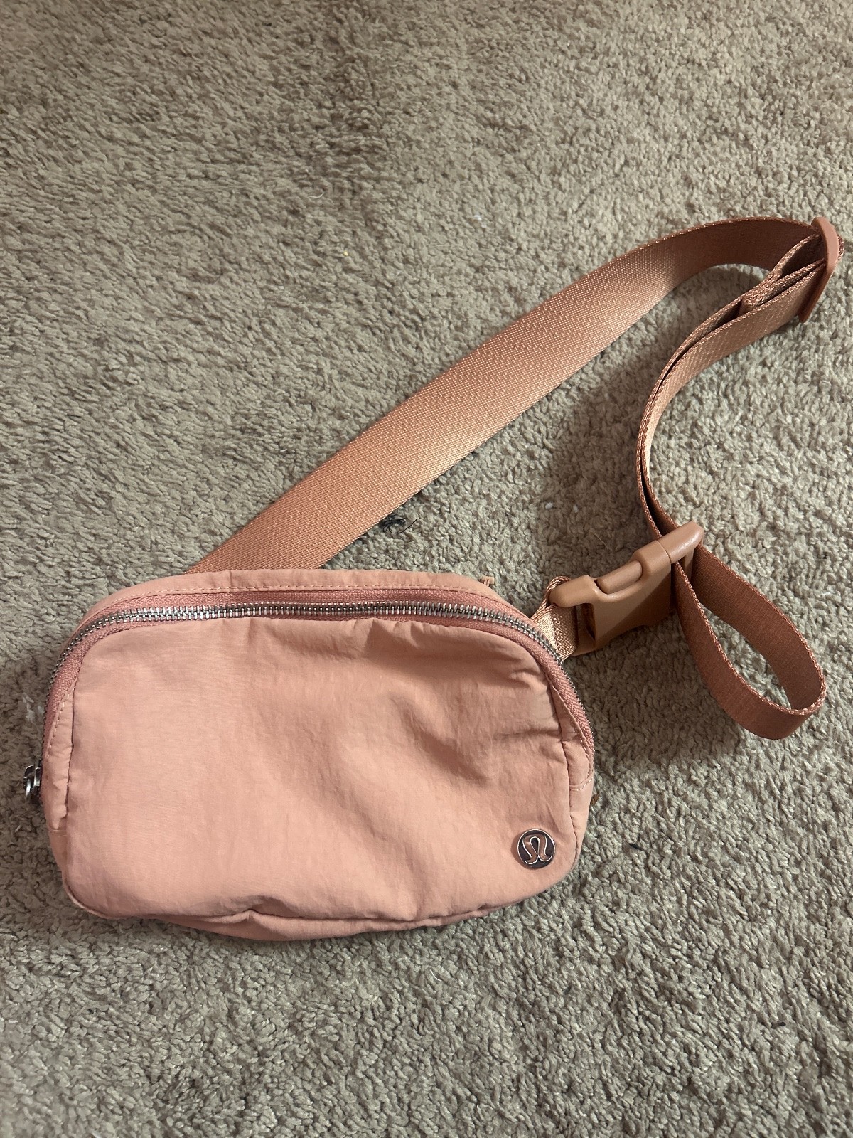 lululemon fanny pack, coral pink color, barely used, shiny logos