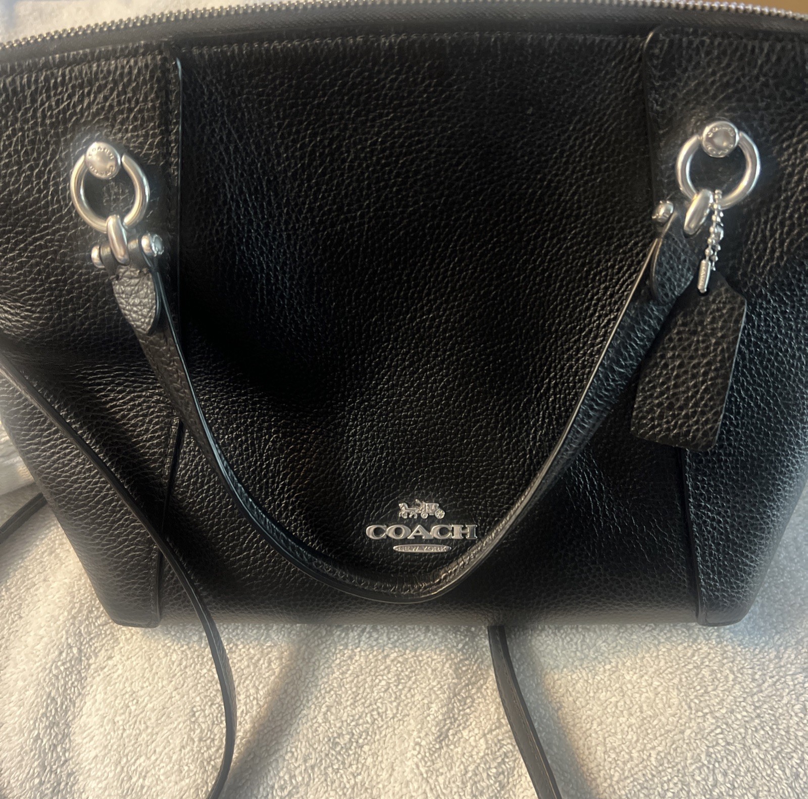 Coach Crossbody Bag Black Pebble Leather black Interior with silver hardware.