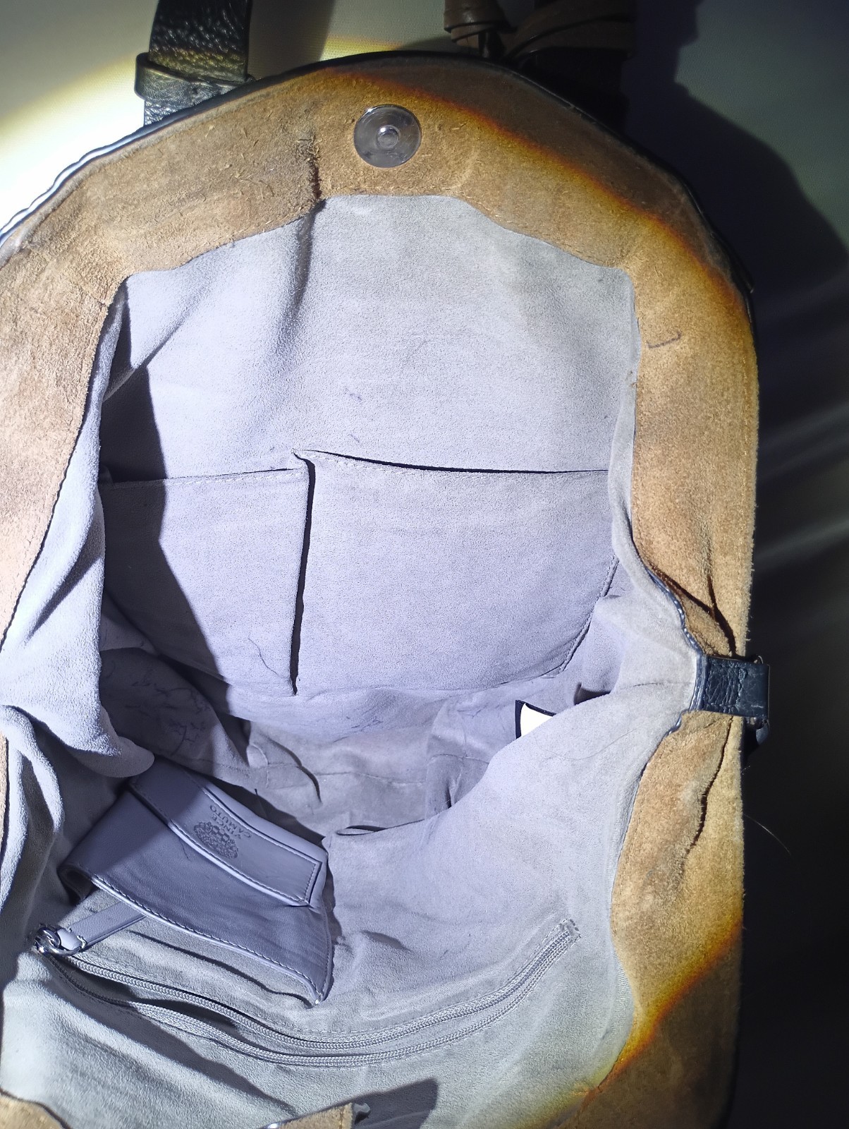 Vince Camuto bag with a suede body and a crocodile-embossed leather panel.
