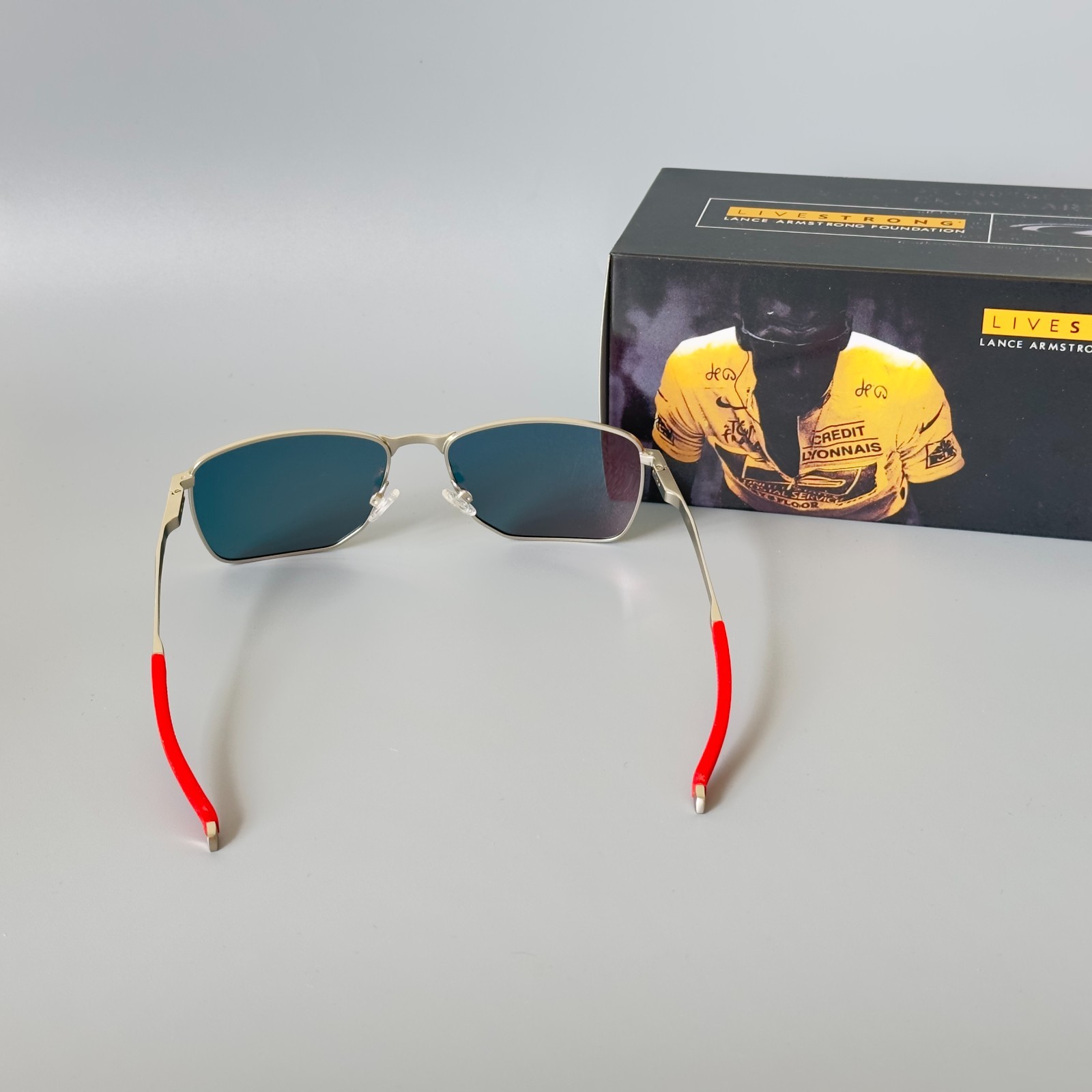 Oakley Ejector OO4142 Polarized Sunglasses Silver Frame Ruby Polarized lenses
