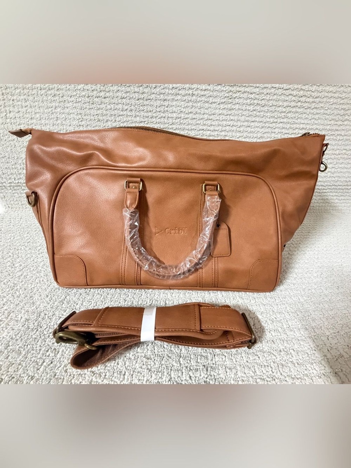 KAPSTON tan synthetic leather Cribl weekender duffel bag