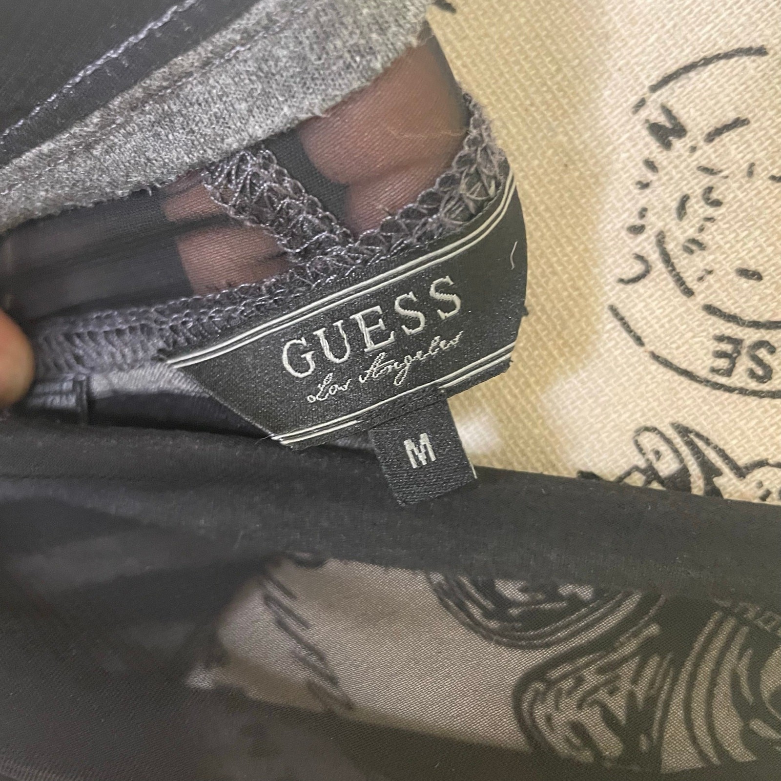 Black and grey striped guess top