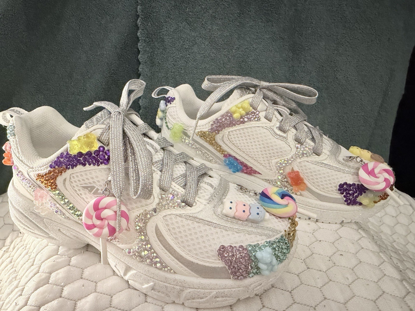 Hand-customized white Avia sneakers with silver laces. Shoe size is 1.