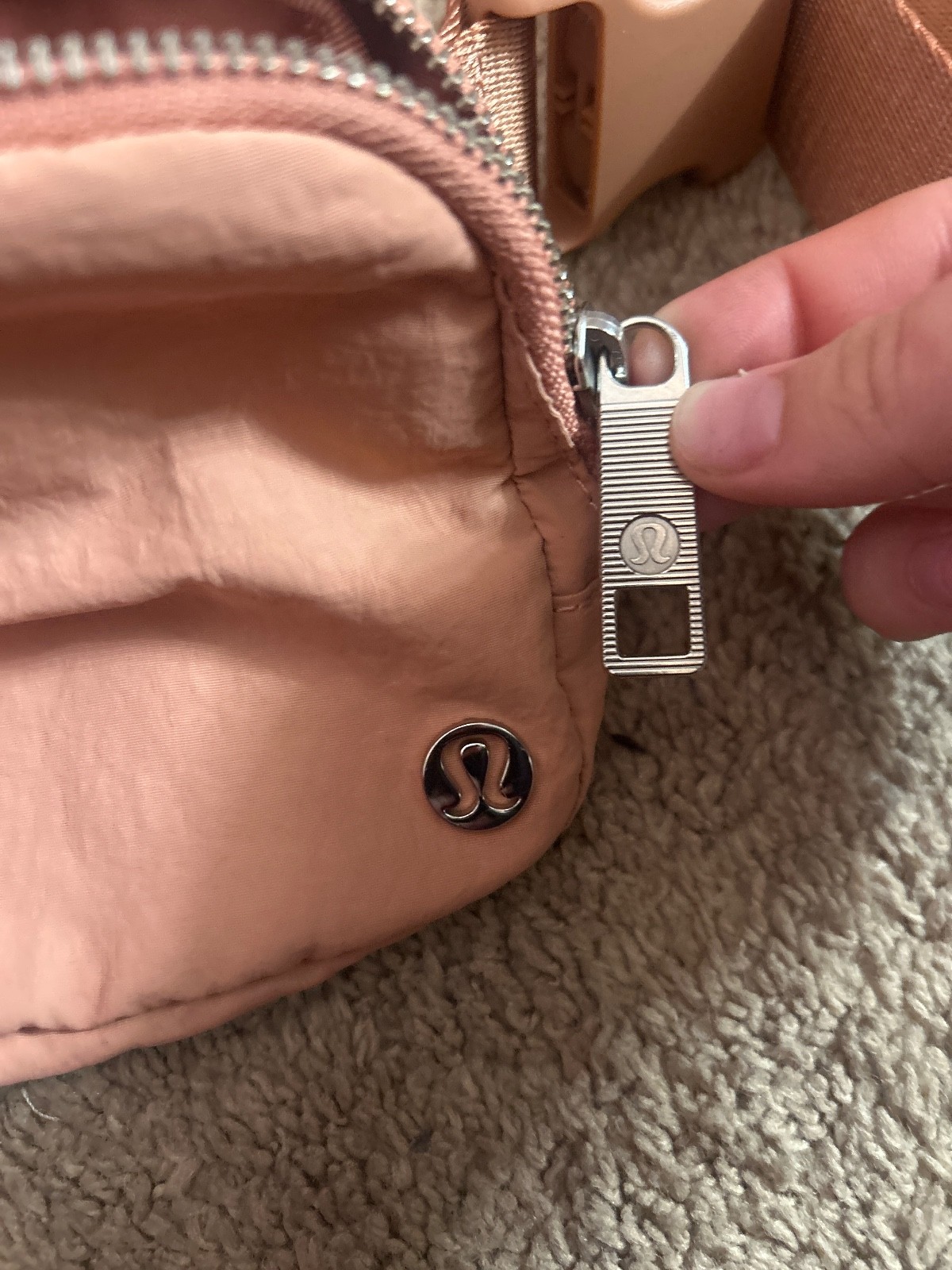 lululemon fanny pack, coral pink color, barely used, shiny logos