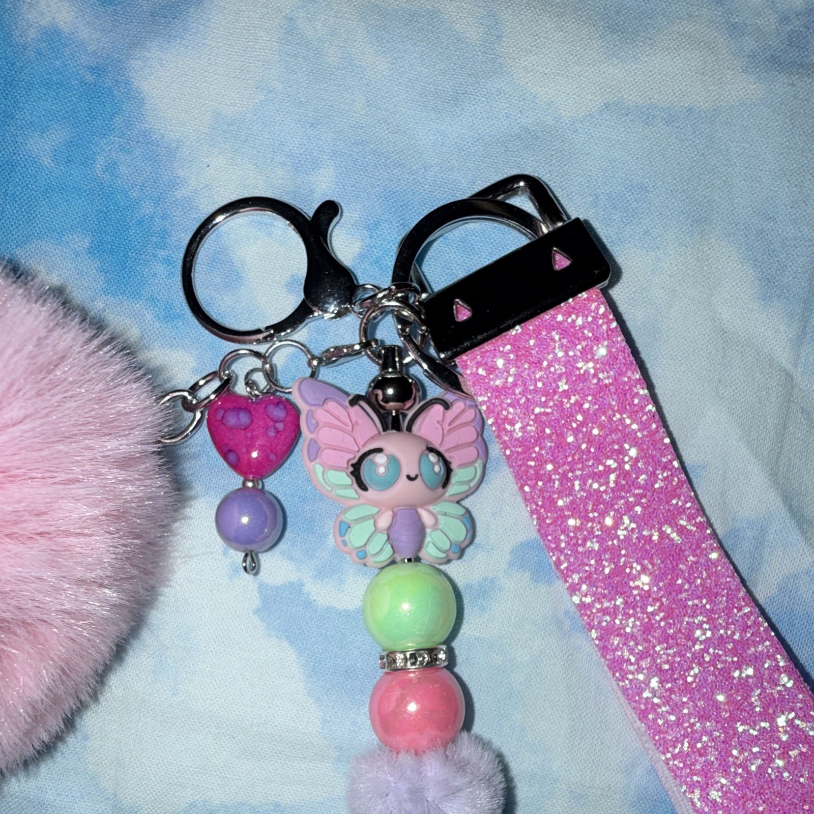 Pink Glitter Wristlet Strap Key Chain/Bag Charm w/Butterfly Beads & Pom Pom