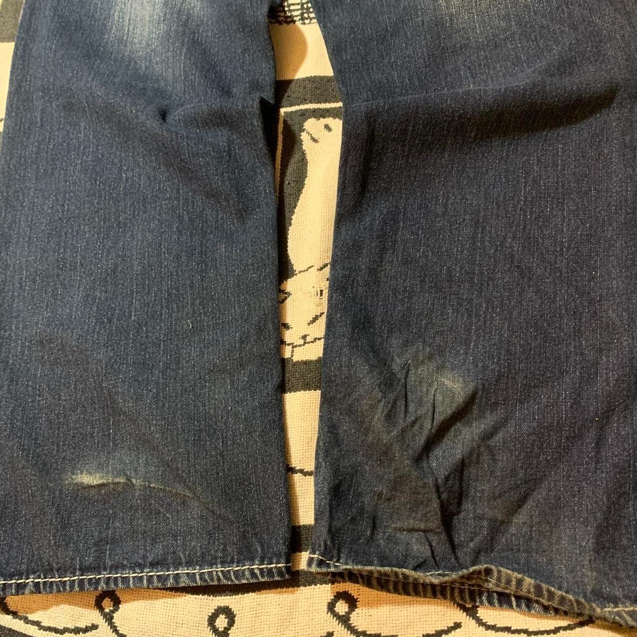 Avirex embroidered jeans with gold embroidered designs on back pockets Size 34