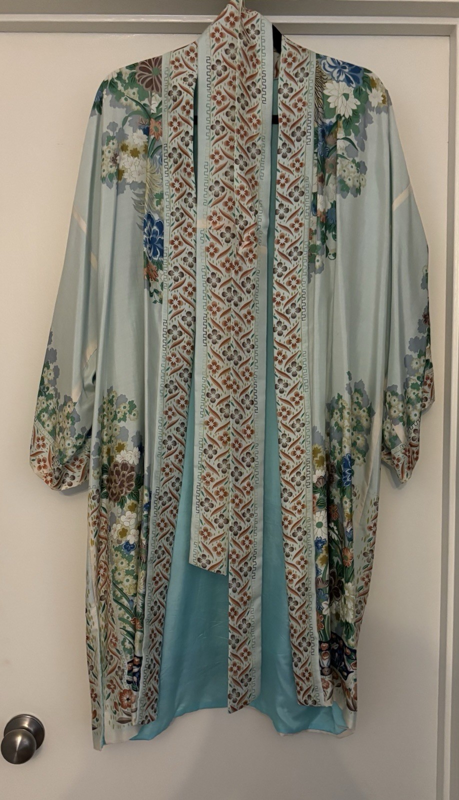 100% Silk Robe Made In Japan Pale Blue, Floral With a Pale Aqua Lining. One Size