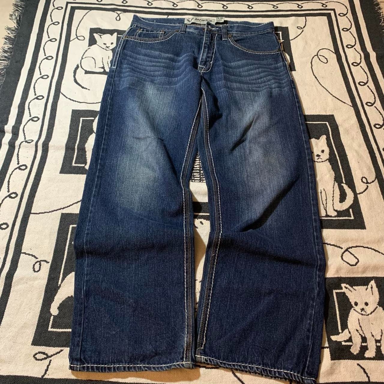 Avirex embroidered jeans with gold embroidered designs on back pockets Size 34