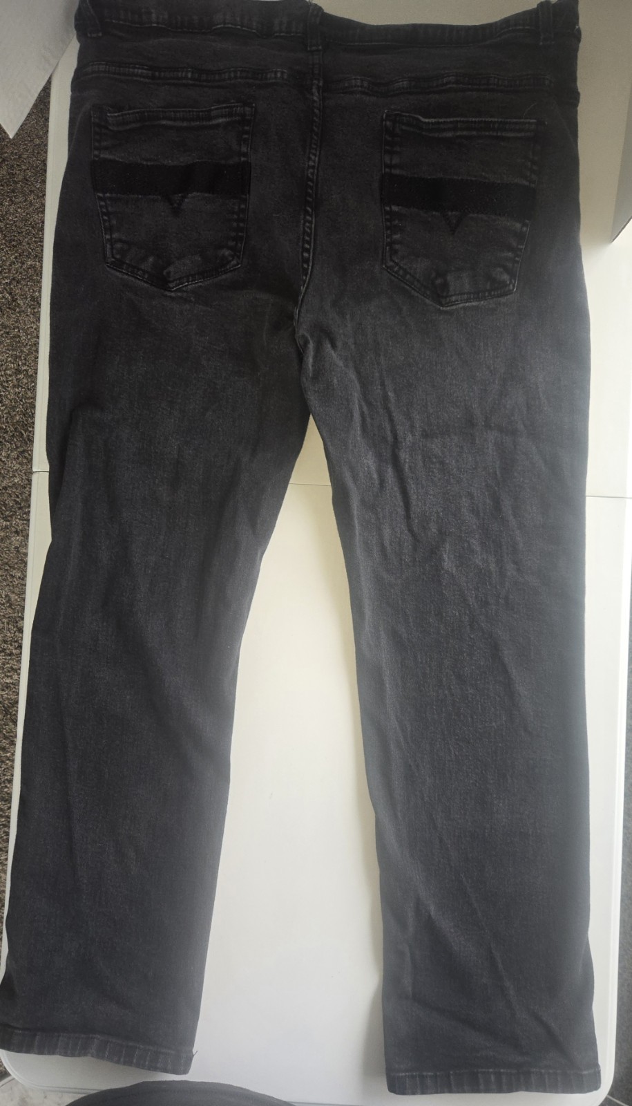 Mens size 48 faded black denim jeans.