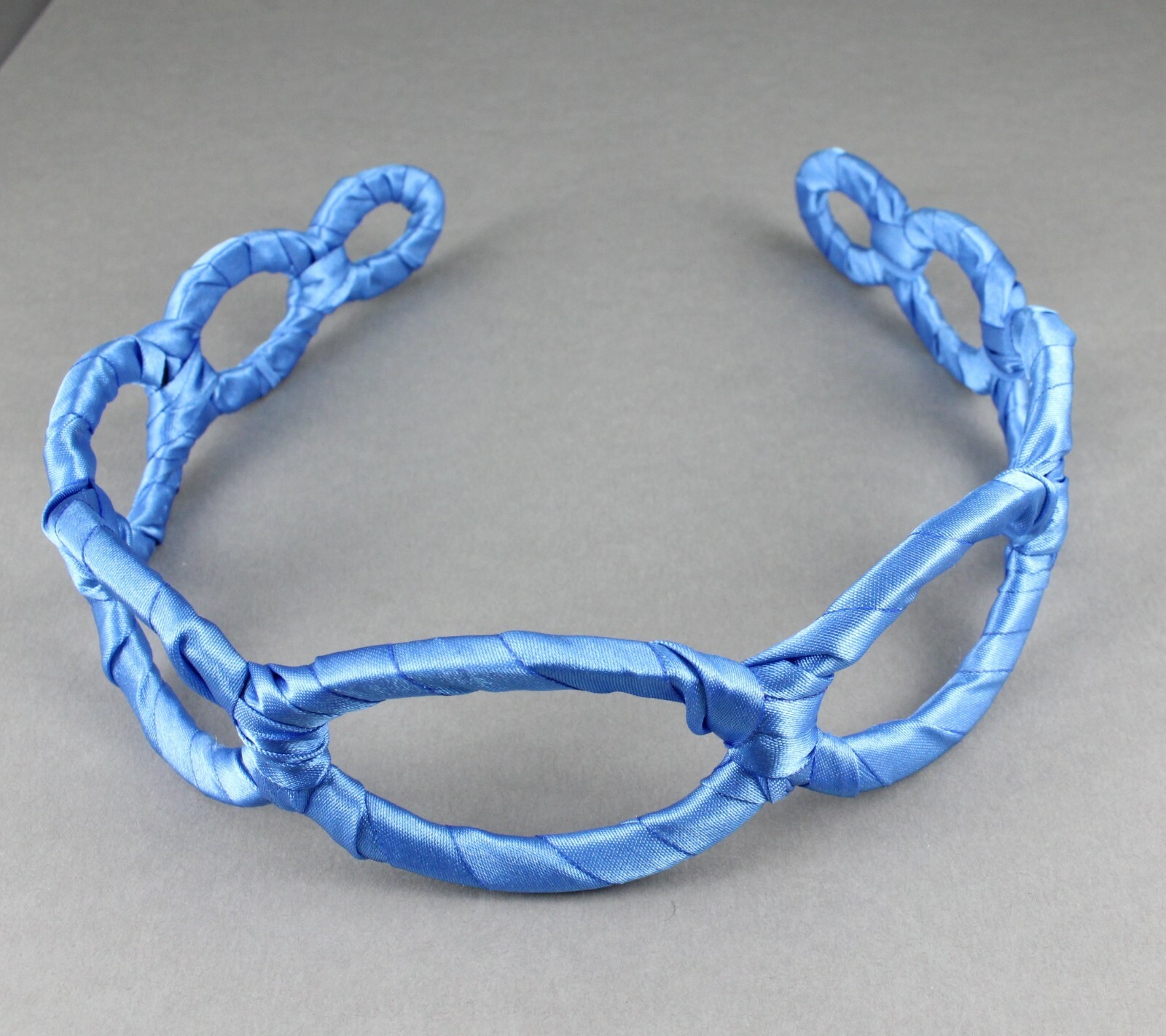 Aqua satin wrapped fabric 1 3/8″ wide headband oval chain link cut out pattern