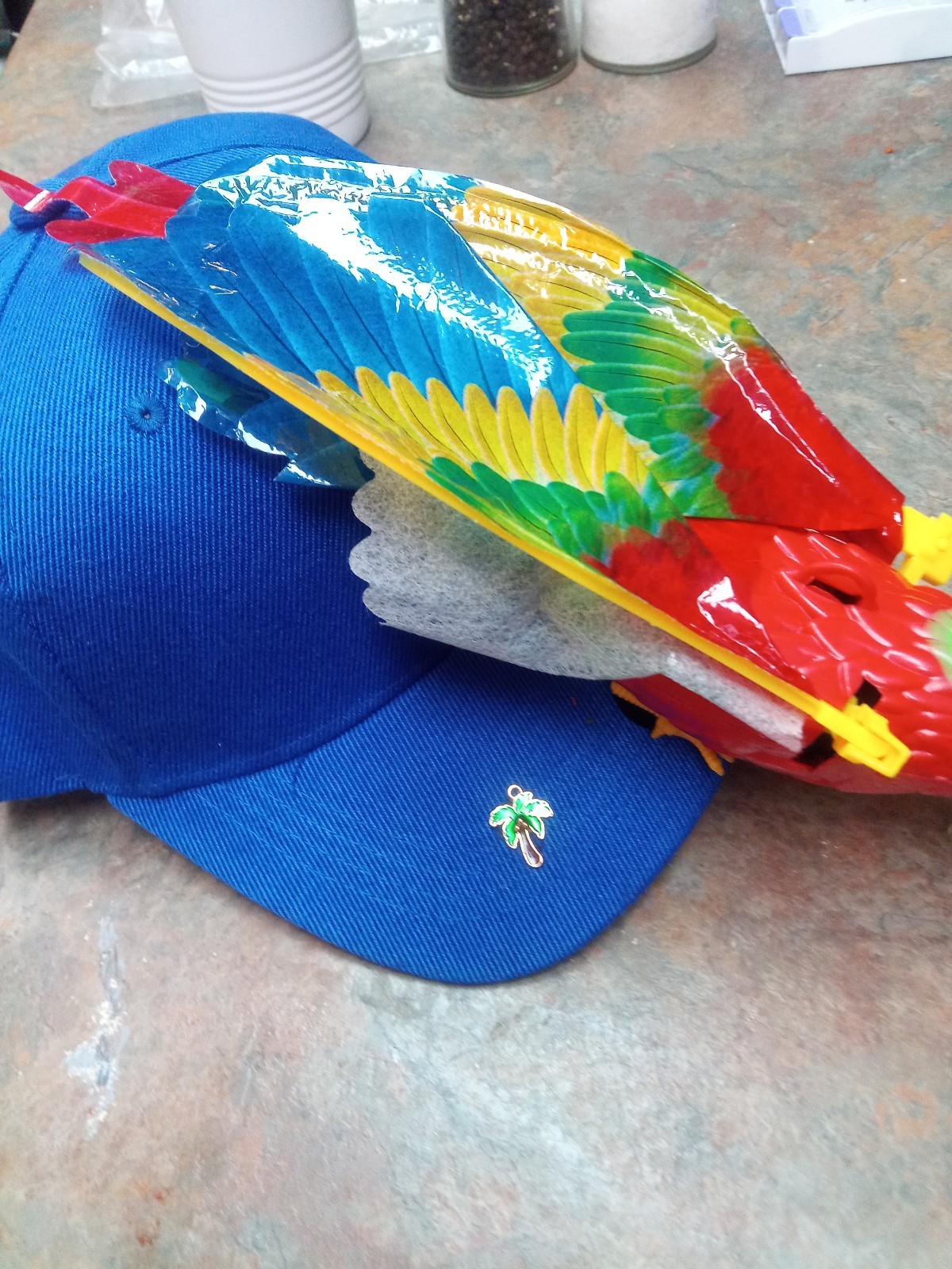 Parrot Head Hat 3D flapping wing bird with light up eyes & sound Jimmy