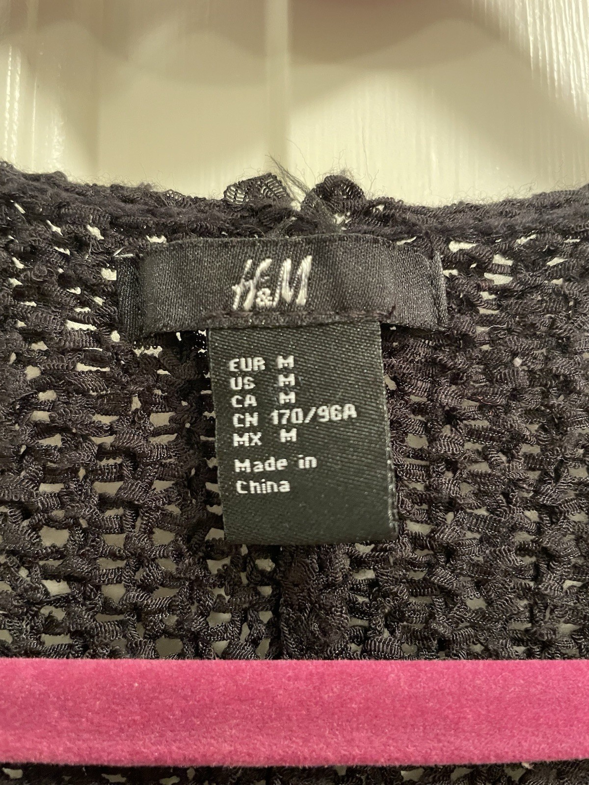H&M black knit sweater, M