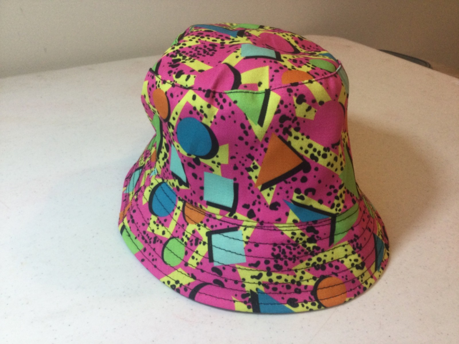 Pink/ multicolor 1980’s style one size fits all Bucket hat