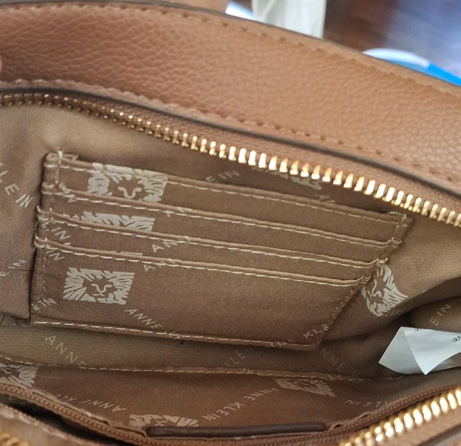 Anne Klein Logo Zip Crossbody Bag Beige/Brown Adjustable Strap Inner Pockets