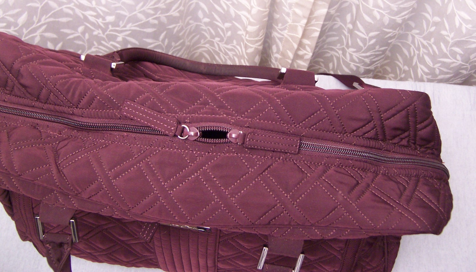 Vera Bradley Duffel/Weekender – burgundy quilted cotton with crossbody strap