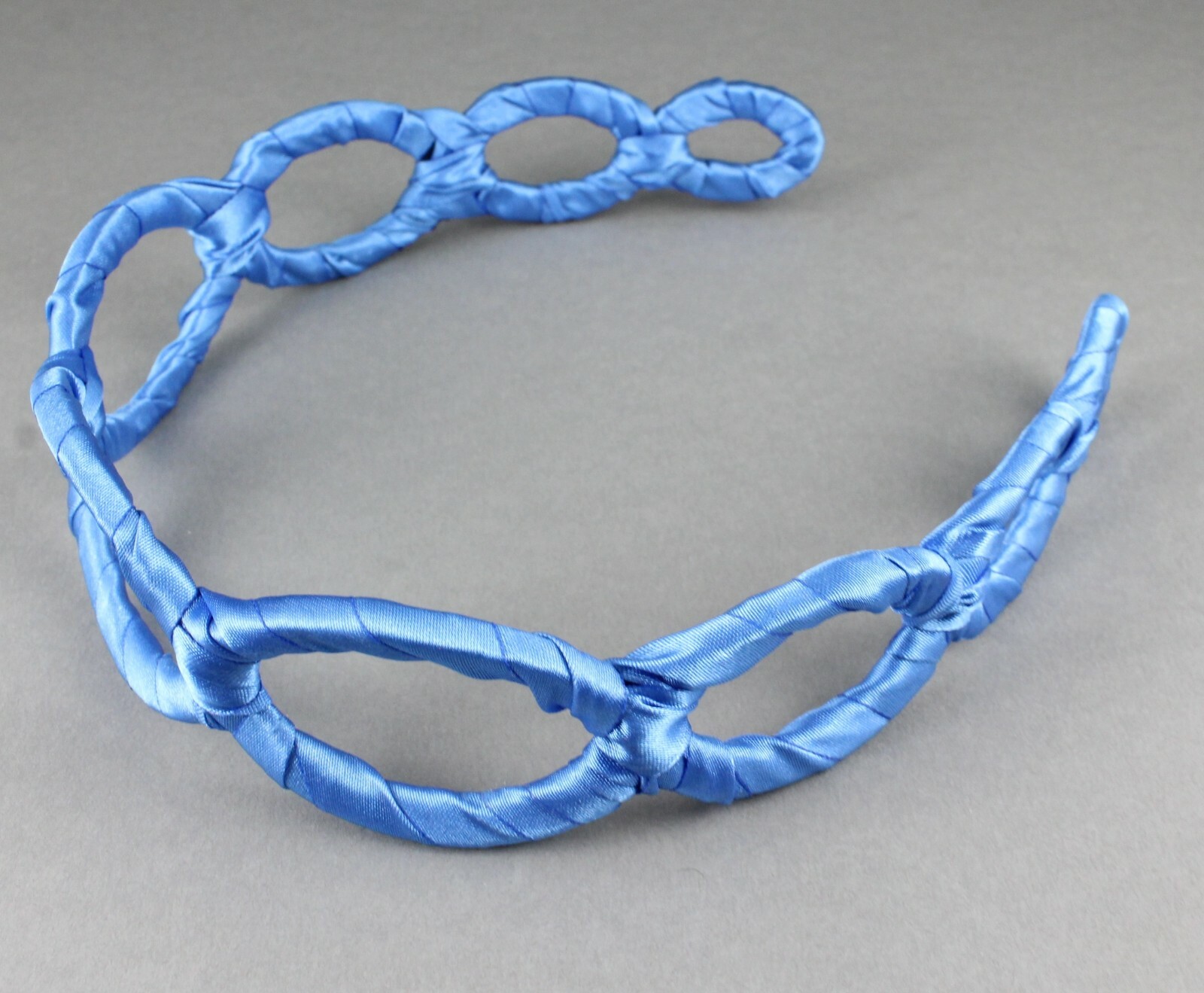 Aqua satin wrapped fabric 1 3/8″ wide headband oval chain link cut out pattern