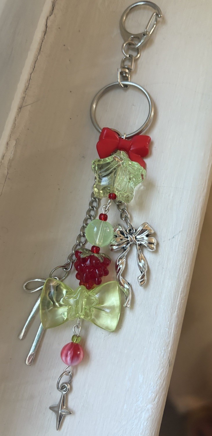 Handmade Raspberry themed acrylic beaded silver bow accented keychain