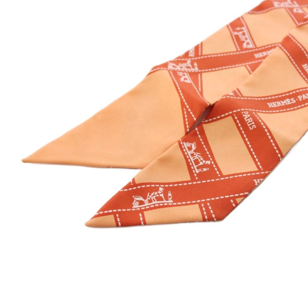 Hermes Twilly Bolduc Au Carre Scarf AN75 Silk Orange 82cm Length 4.8cm Width