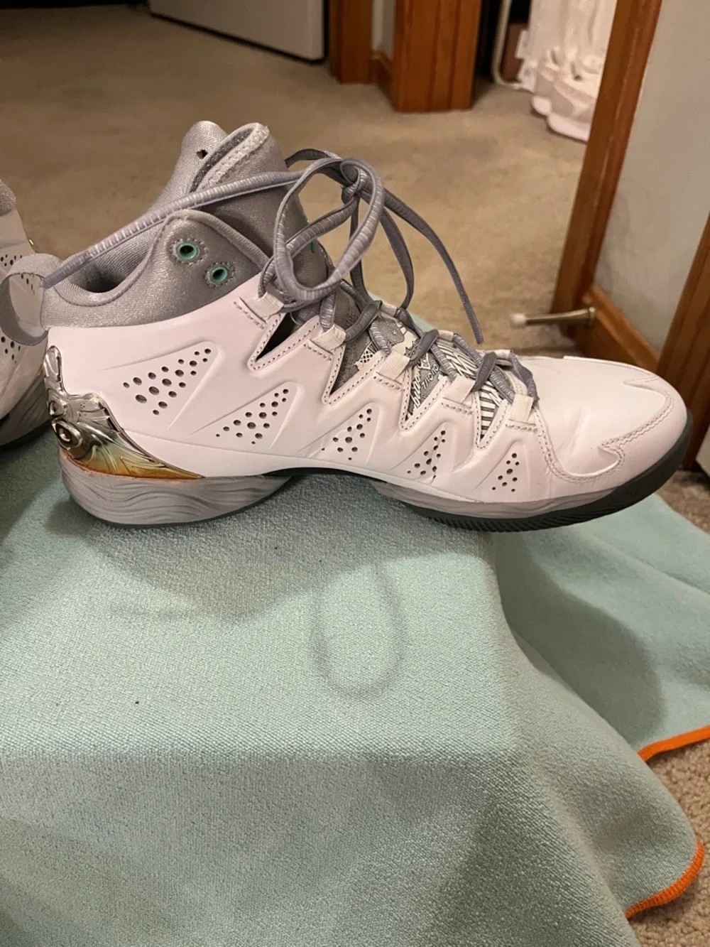 Air Jordan Melo M10 in the Green Glow color way
