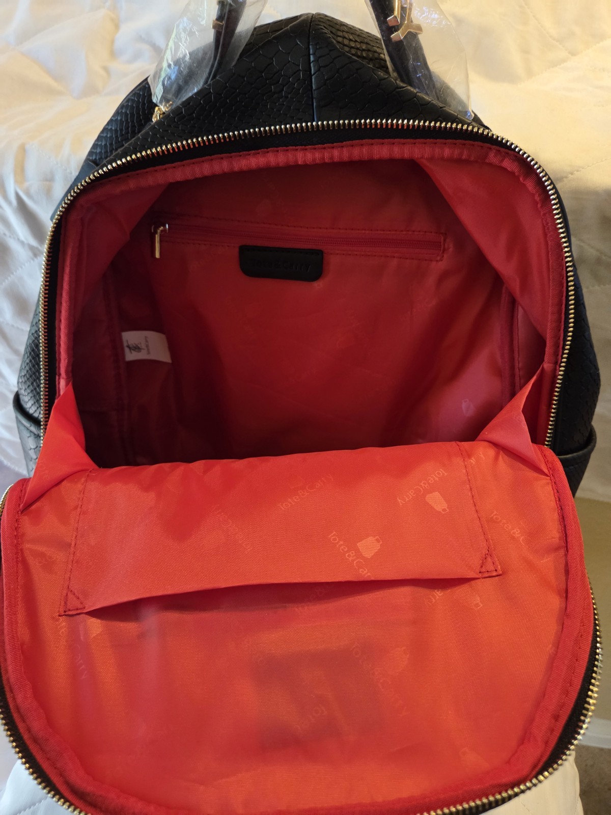 NEW Tote & Carry Black Textured Faux Leather Backpack Gold Hardware Red Lining