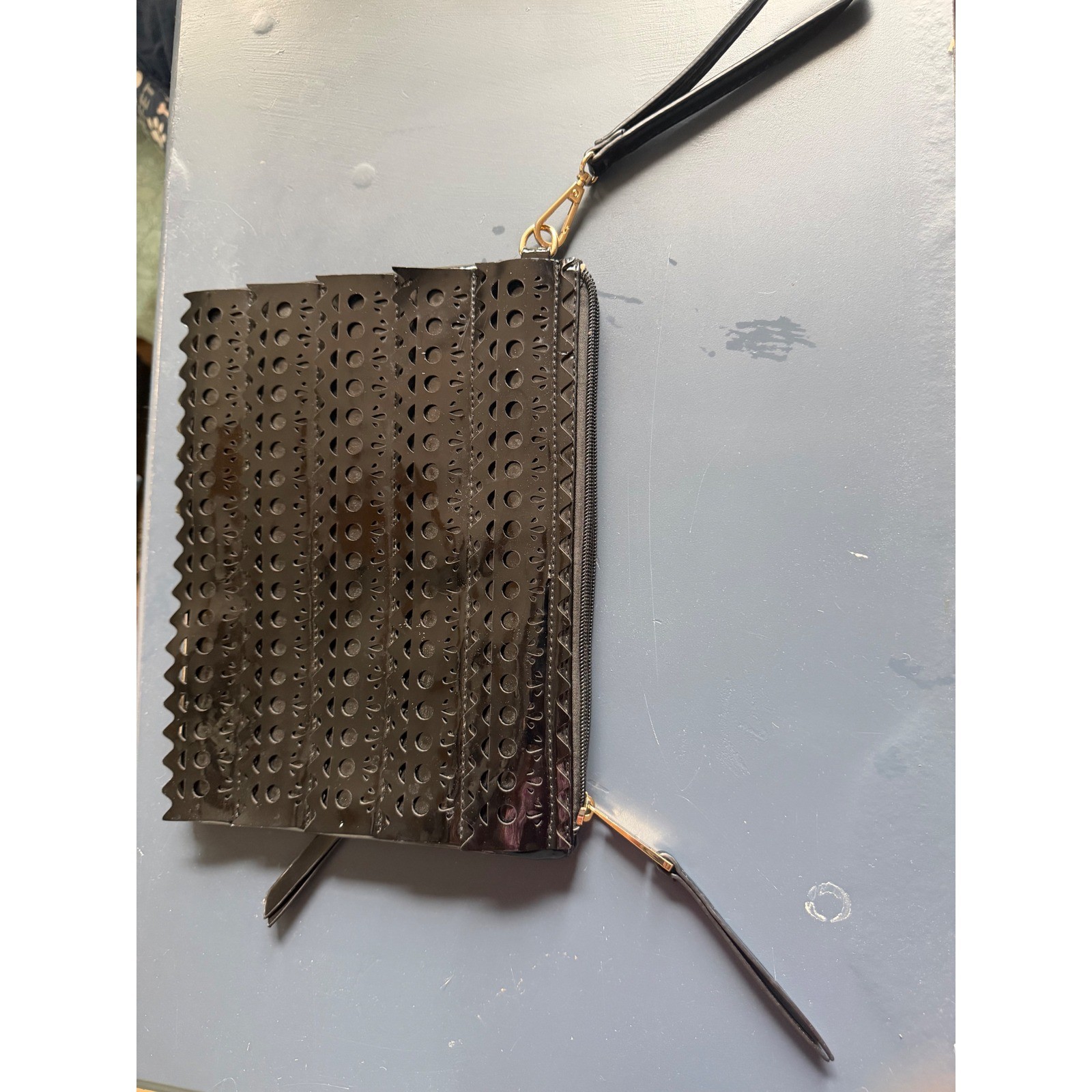 Sondra Roberts Squared Black Patent Laser Cut Eyelet Wristlet Clutch Bag