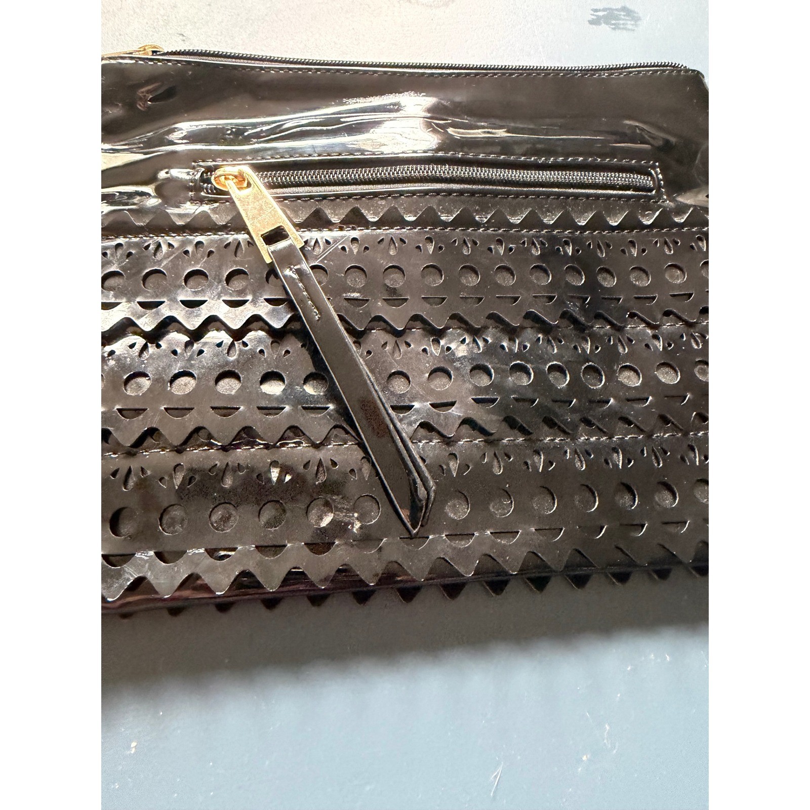 Sondra Roberts Squared Black Patent Laser Cut Eyelet Wristlet Clutch Bag