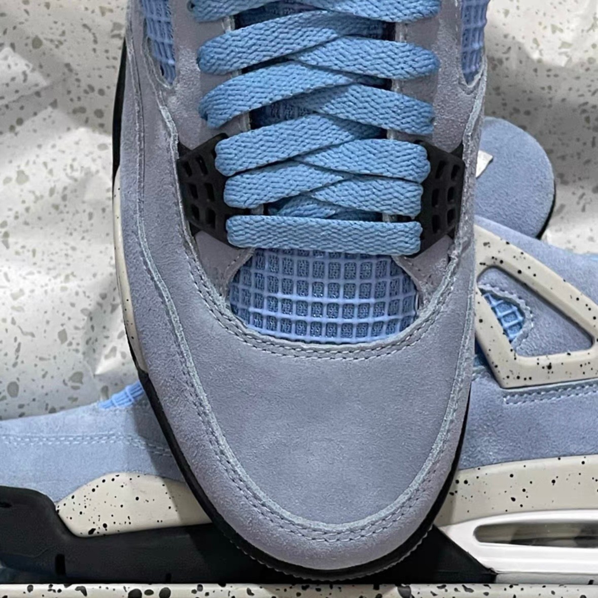 Jordan 4 Retro “University Blue” Basketball