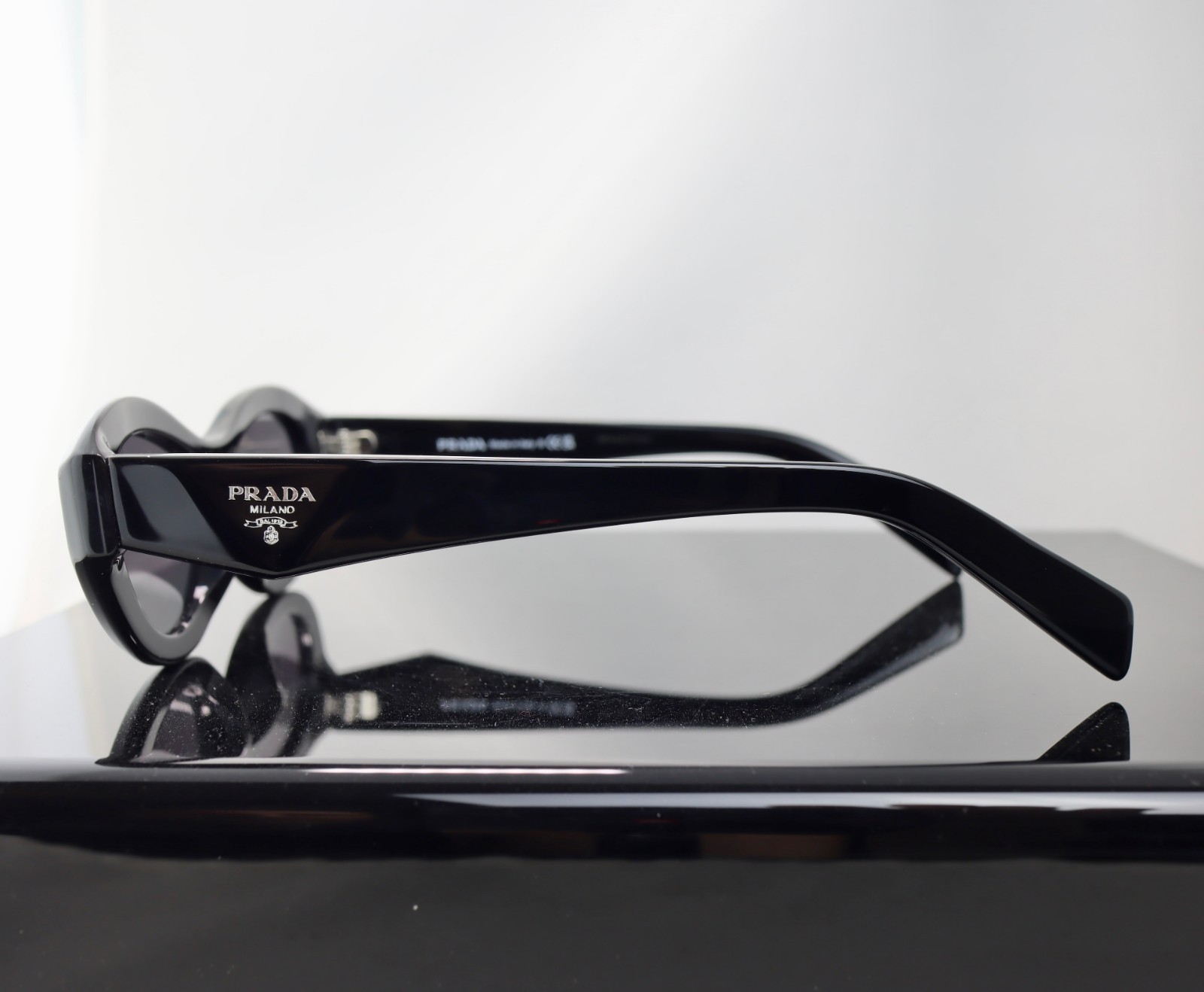 Prada PR26ZS Black / Gray Lens Oval Sunglasses 100% UV