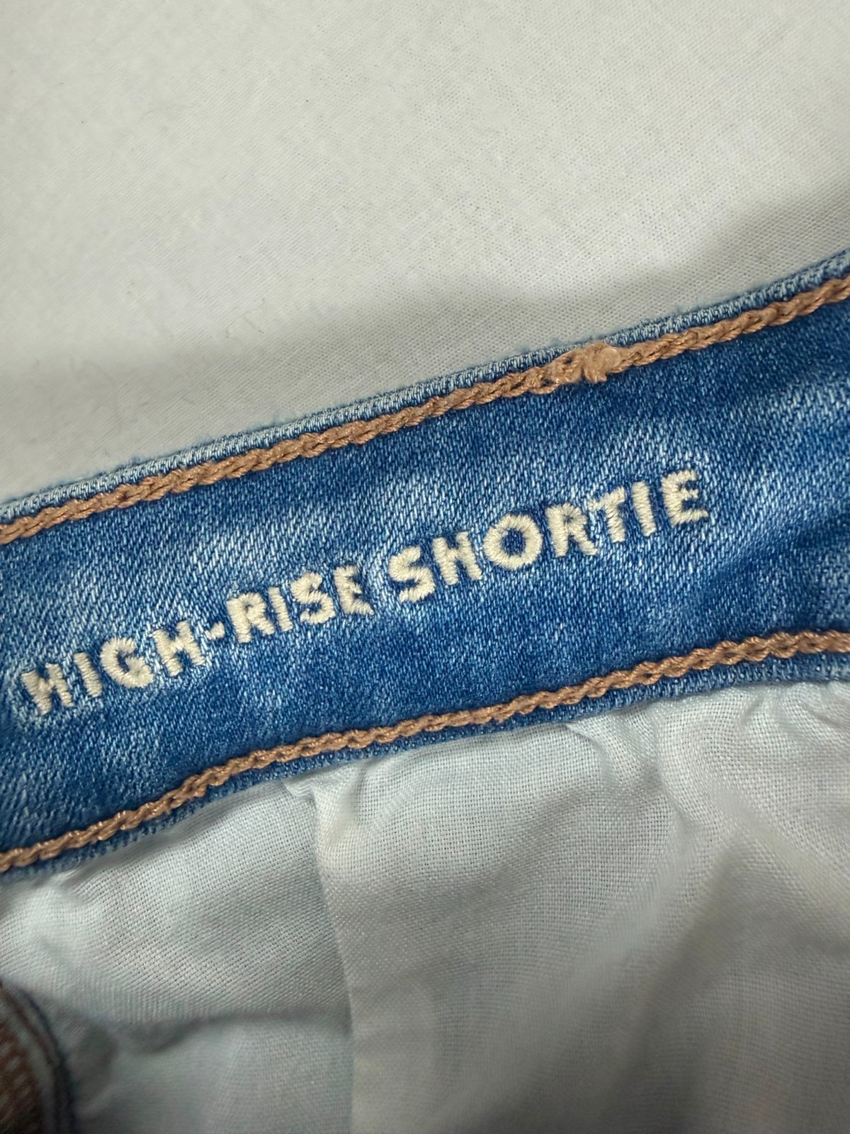 American Eagle Hi-Rise Shortie Light Wash Distressed Denim Shorts Lace Detail