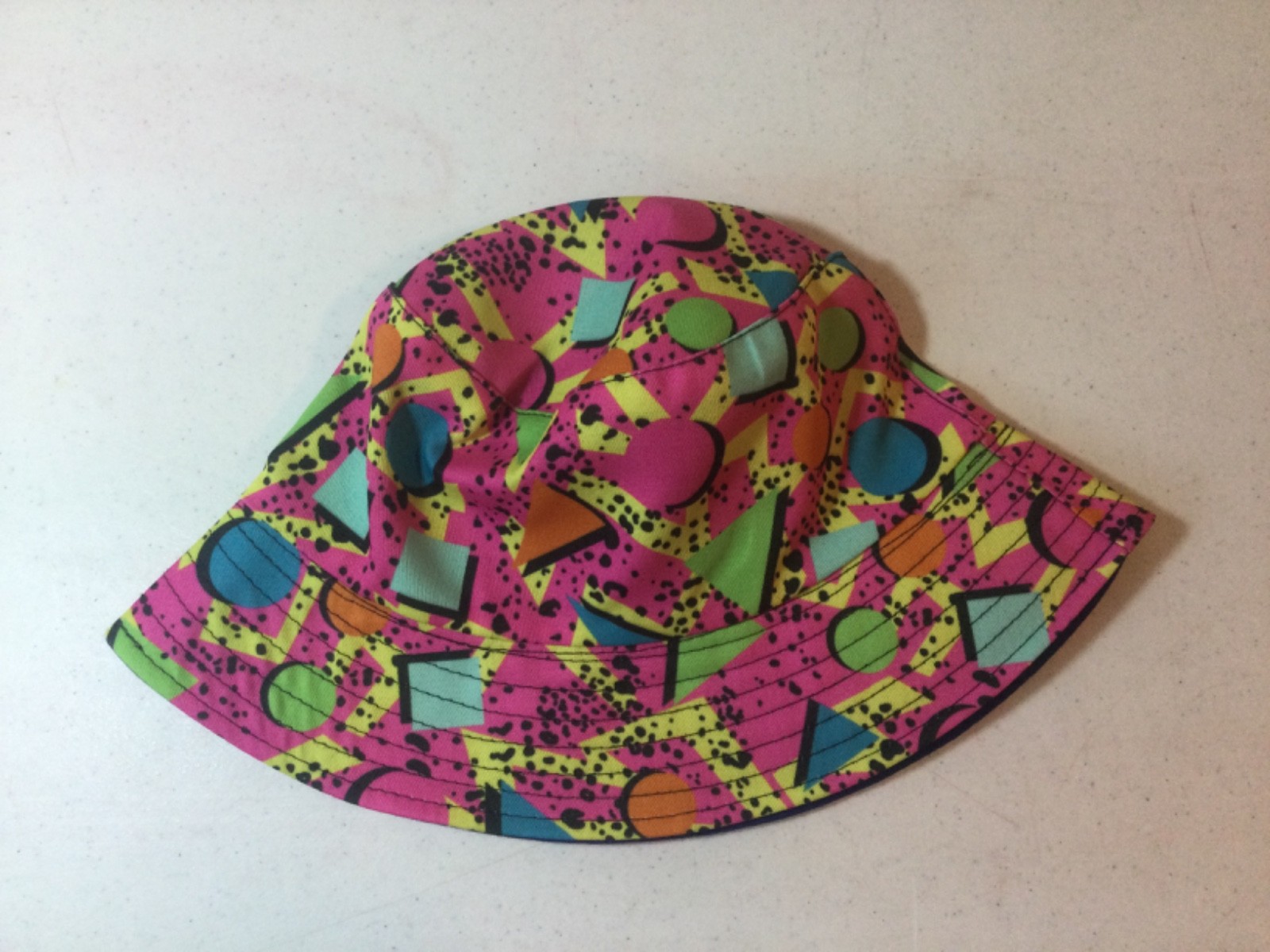 Pink/ multicolor 1980’s style one size fits all Bucket hat